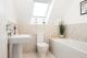 Modern white and natural colour bathroom - Newbury Racecourse, David Wilson Homes