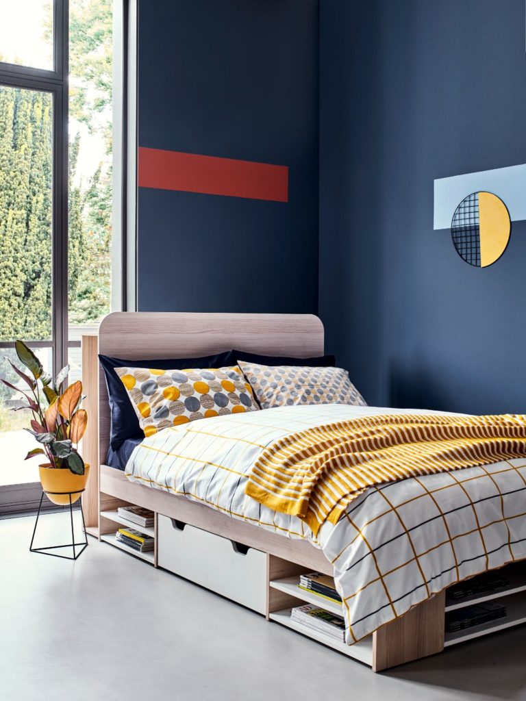 Dark navy room with light wooden Pico Double Bed and Mustard Metal Planter