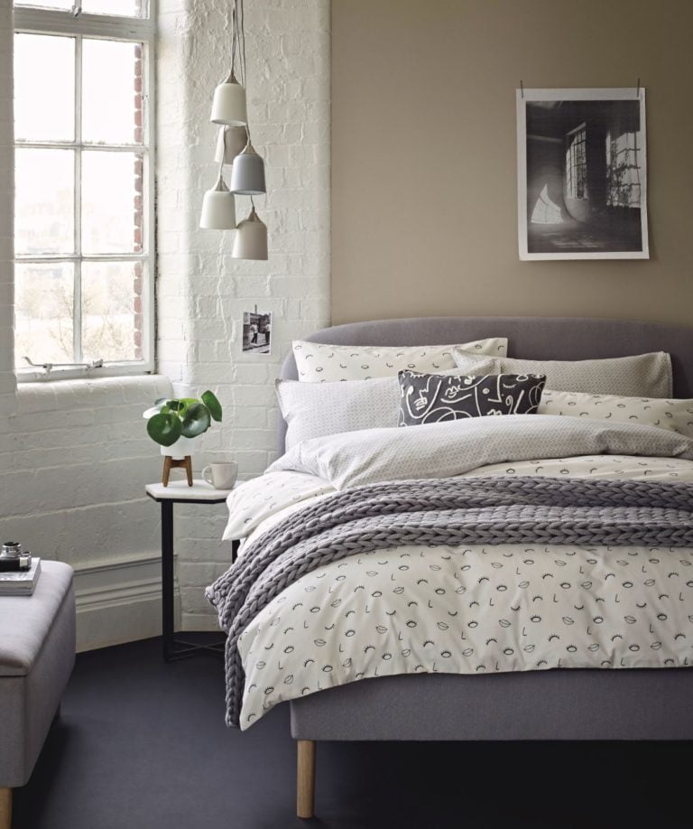 Marks and Spencer light grey Mila Bed on wooden legs, Sandford White Marble Hexagonal Table with white Etta bet set and a grey chunky kinit throw