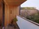 Balcony with wooden panelling roof and walls