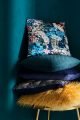 Aqua blue walls with floral print cushion
