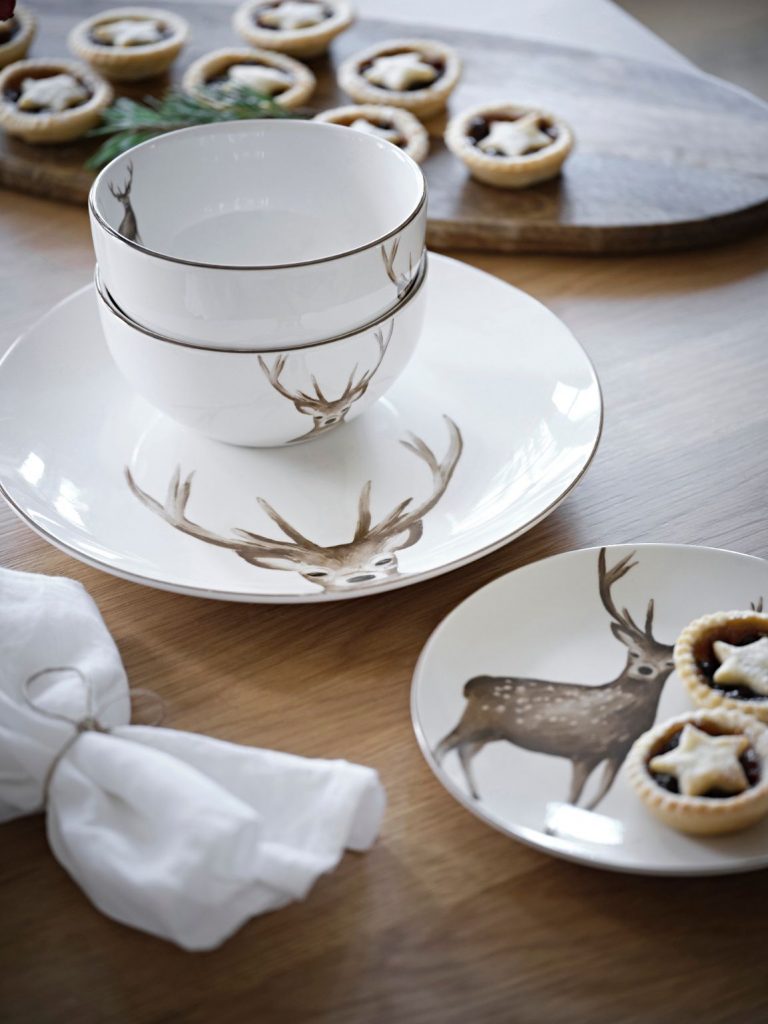 Christmas plates with reindeer illustrations