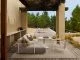 Tribu Nodi Garden Sofa in a modern outdoor setting. In Two Homes.