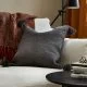 Grey cushion with tassels