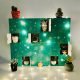 Little succulents, cacti and air plants in a green advent calendar.