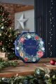 Festive tea lights in a wreath shaped advent calendar.