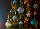 Dark room with colourful Christmas tree
