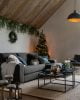 Modern black and white lounge with Christmas tree