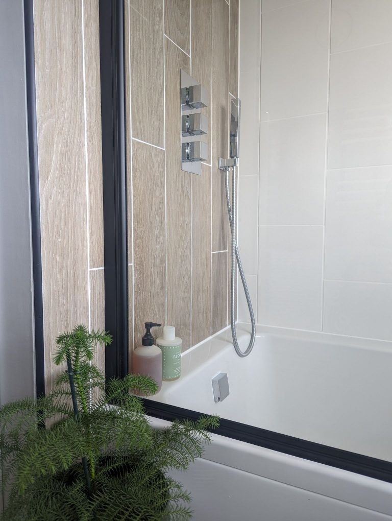 Faux wood tiled shower.