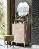 Large oak storage chest with A shaped legs and built-in round mirror.