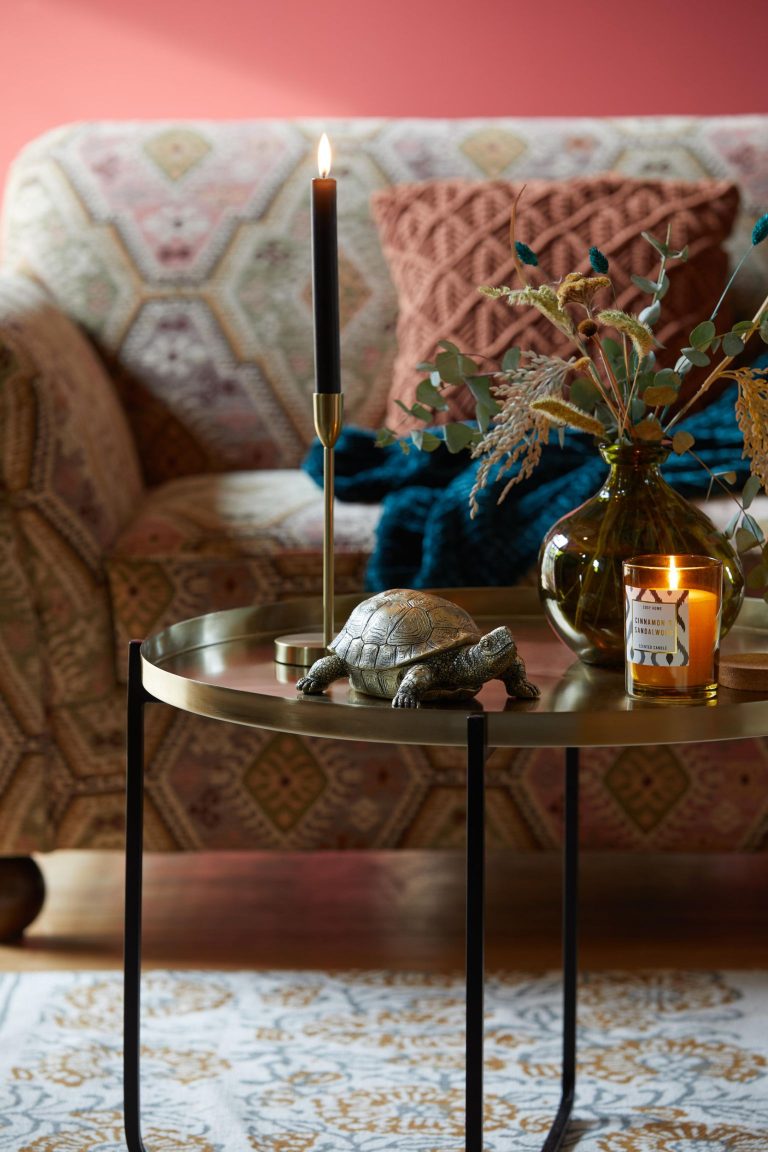 Luxe traveller gold tortoise glasses holder, gold candle holder and recycled glass vase from Dunelm.