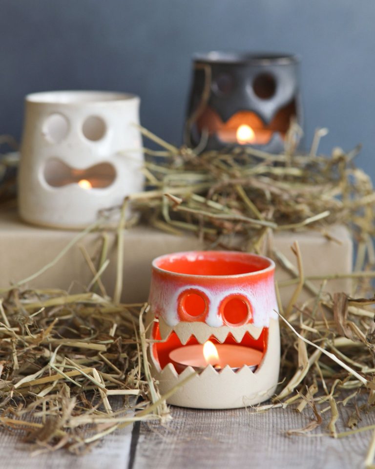 Halloween candle tea light holders in three designs including a bat, ghost and pumpkin candle holder.