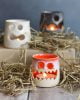 Halloween candle tea light holders in three designs including a bat, ghost and pumpkin candle holder.