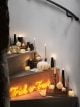 Staircase feature a neon 'Trick or treat' Halloween light, candles and light up pumpkins.