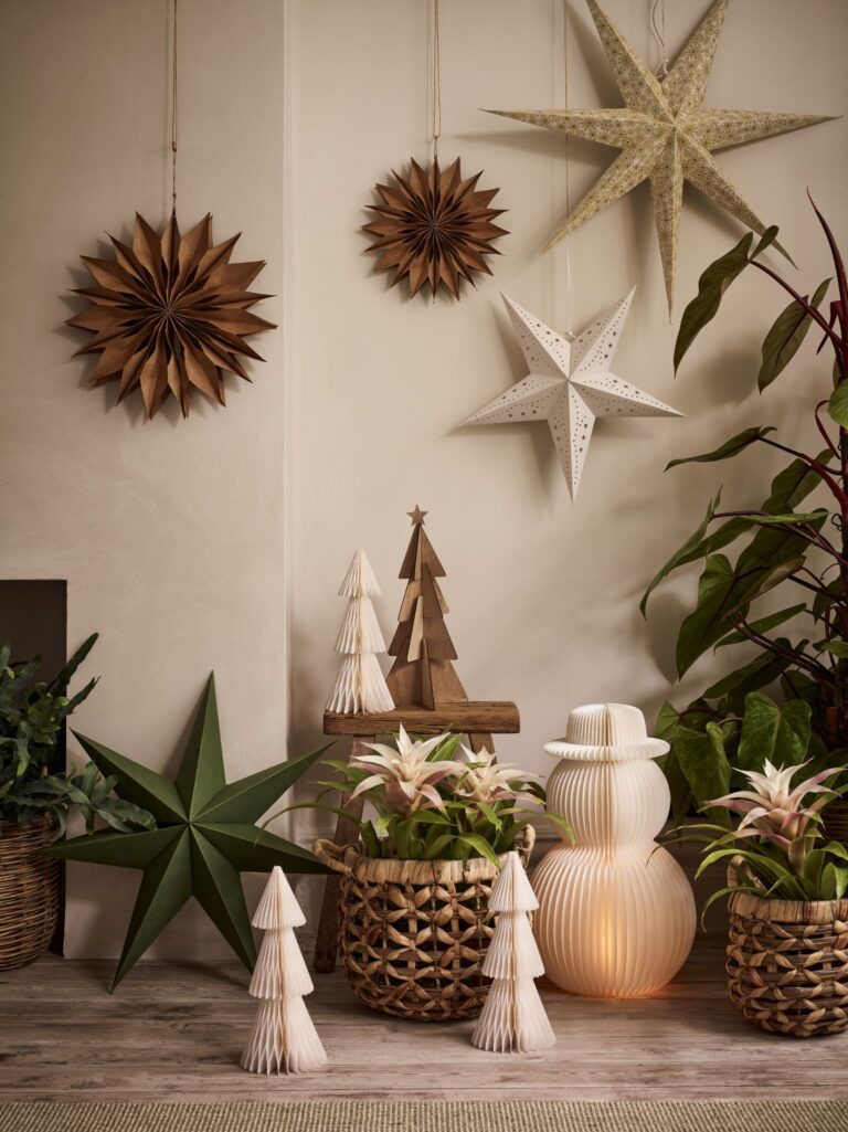 Large paper Christmas stars, paper pop-up trees and plants from Dobbies.