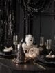 Black Halloween dinner table.