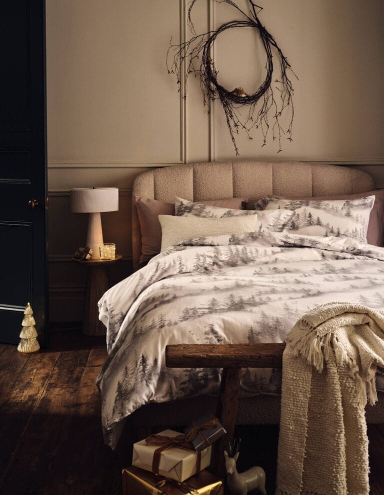 Plain bedroom with brushed cotton winter scene bedding from Marks and Spencer.